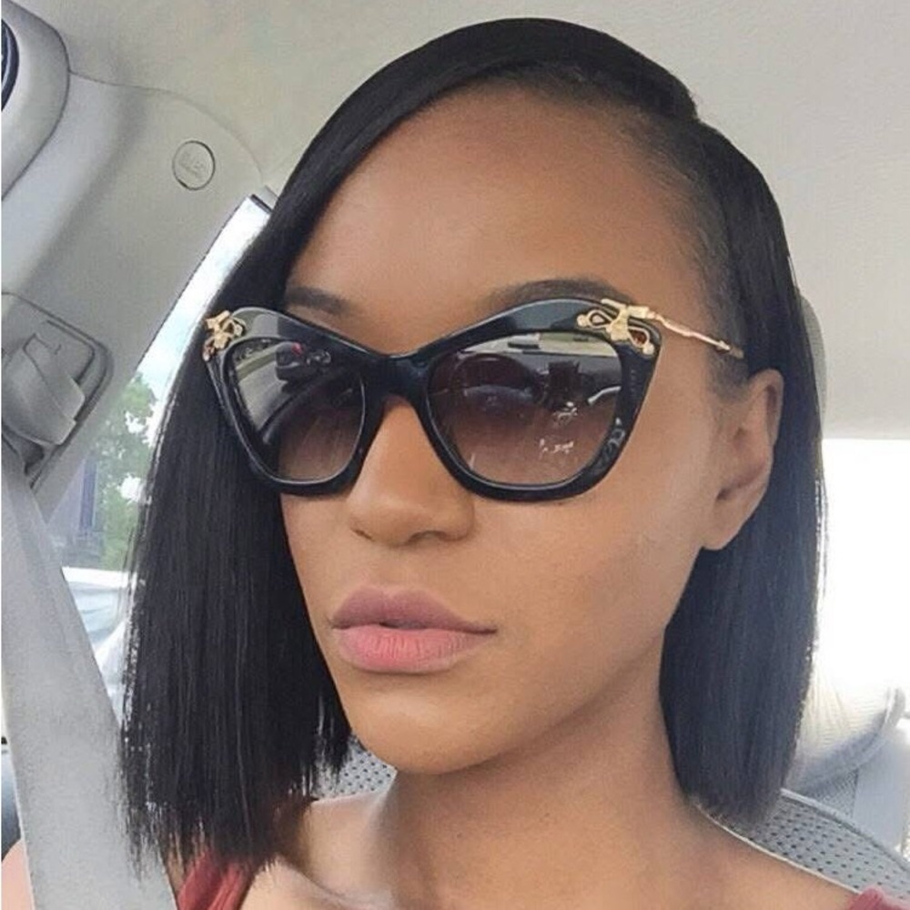 Miu Miu Black Sunglasses with Gold Accents